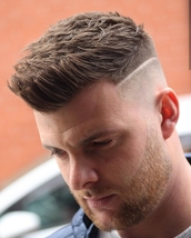 Surgical Part Skin fade and surgical part on the back and sides, textured on top with extra length l