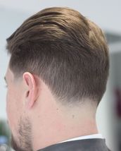 Taper Gone from a scissor cut with a skin taper too a 4 back and sides with a skin taper.