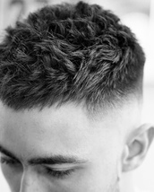 Textured Crop Back and side fade from zero to 1 with clippers then continued fade with scissors for 