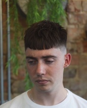 Textured crop Textured hair with cropped fringe and skin fade.