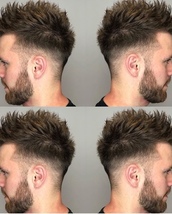 Textured hair cut Fade with scissor cut to top giving that textured style for alot of movement