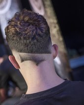 The broken mirror fade Reversing the fade at the rear for the creative edge and breaking the ends up