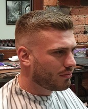 The sport science skin fade High super tight skin fade with a classic quiff. With a 1.5 beard tidied