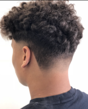 Unique taper fade Unique taper fade curly style Afro on top really sharp line up finished with a raz