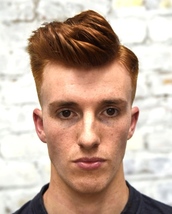 Vintage whirls Old school cut with skinfade, parting, pomped fringe with spiralling texture flowing 