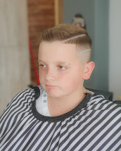 Zero fade comb over Zero fade comb over with a weighted parting, finishing with a surgical line